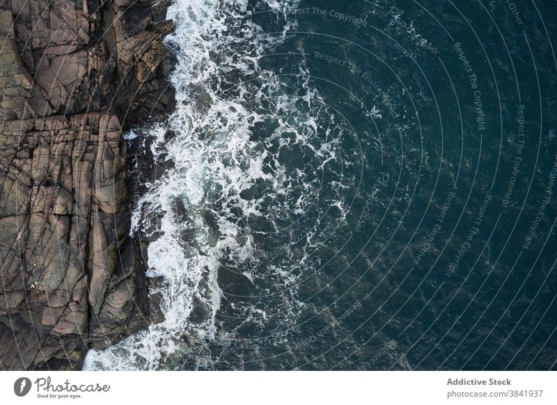 Scenery of rocky coast and waving sea seascape wave spectacular stormy rough shoreline seashore nature water stone foam marine idyllic beach breathtaking