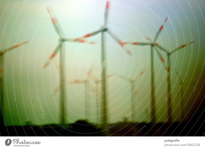 Wind turbines next to the motorway windmills Pinwheel Energy Energy industry Renewable energy Colour photo Exterior shot Wind energy plant Electricity