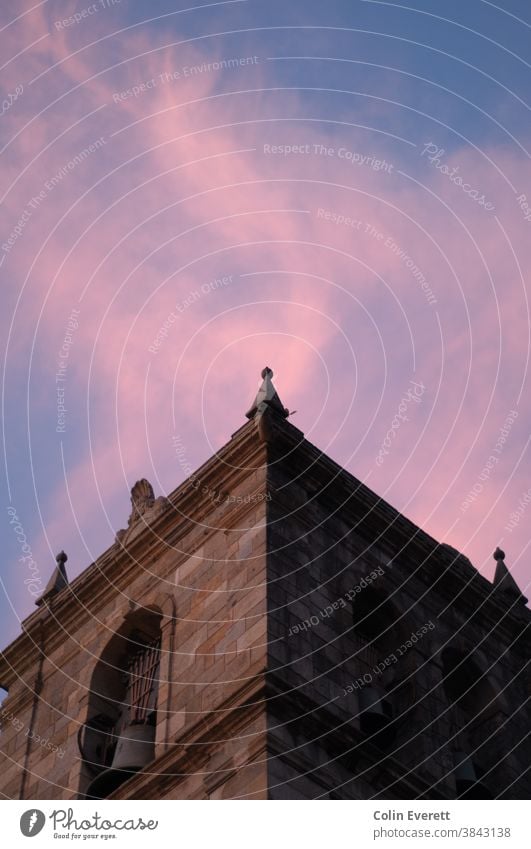 Pink Sunset behind old church belltower Church spire Religion and faith Tower Clouds Colour photo Architecture Exterior shot Manmade structures Historic