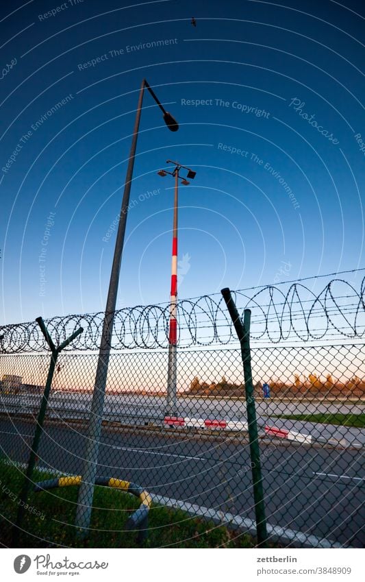 Tegel Airport, two hours before closing Evening Berlin Trajectory Airfield Sky Horizon Line Deserted taxiway Floodlight Skyline Copy Space TXL Transport wide