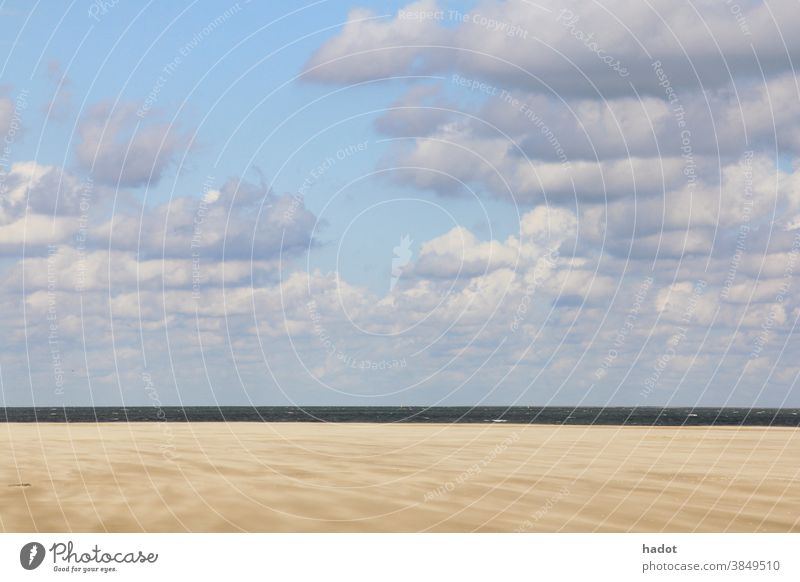 beach blue clouds coast landscape Sand sand beach sea sky surf water waves Beach Ocean Water Coast