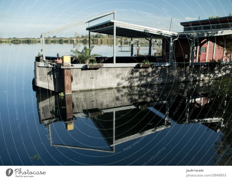 Locality with water view Jetty Surface of water Reflection Lake Calm Idyll Cloudless sky Gastronomy Shadow roofed Brandenburg an der Havel Sunlight