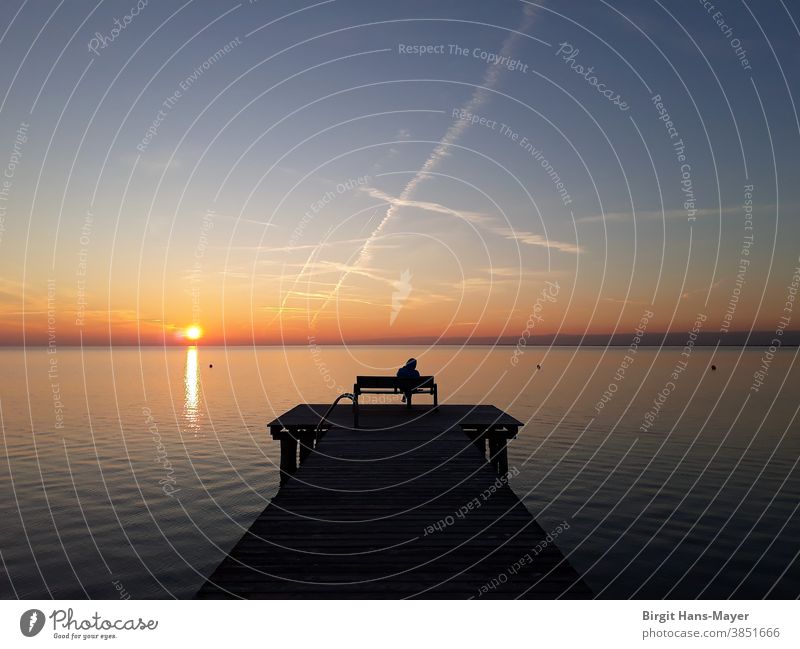 Lonely person at the lake Lake Water Sun Moody Clouds Sunset Evening Reflection Light Sky Nature Calm Blue Lakeside Colour photo Beautiful weather Deserted