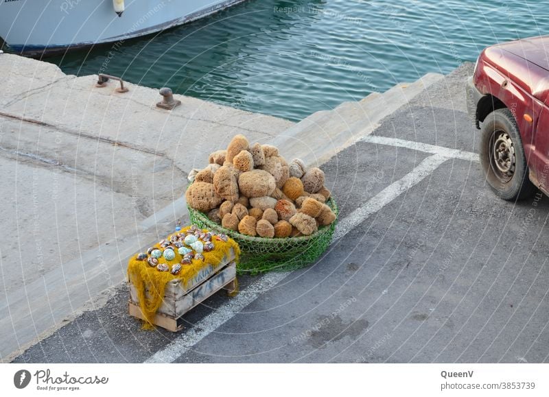 Souvenir stand in a Crete port with products from the sea Ocean Tourism Tradition Sponge Greece Characteristic travel Travel photography Harbour