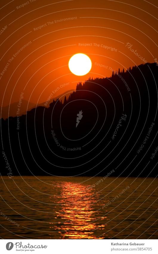 Sunset at Lake Garda Red Water Ocean Evening sunset mountains Landscape Sky Summer Relaxation