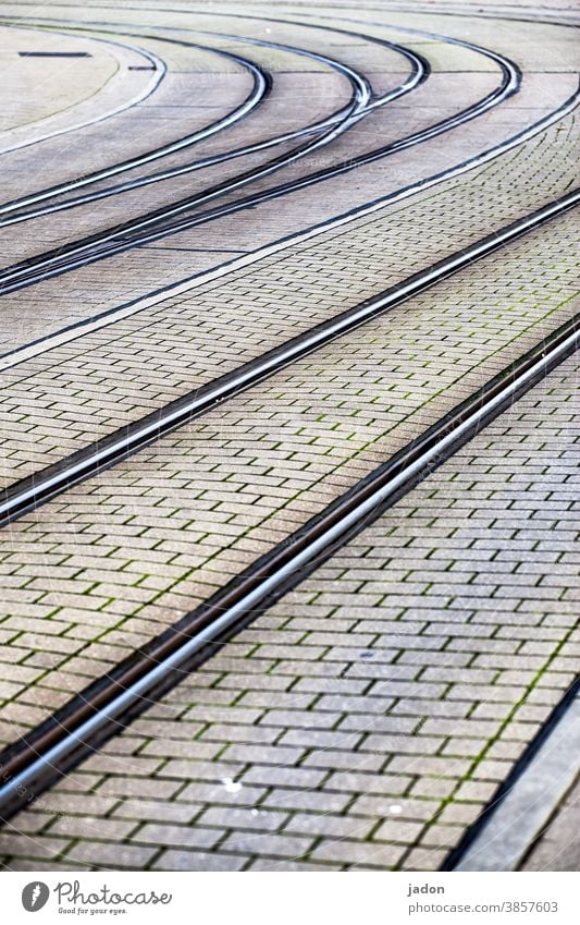 that bend. Railroad tracks Transport Tram Lanes & trails Traffic infrastructure Rail transport Road traffic Deserted Public transit Paving stone Curve Bend