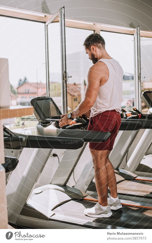 Man exercise  on treadmill in gym active activity adult athlete athletic body club dedication equipment female fit fitness gym time health healthy