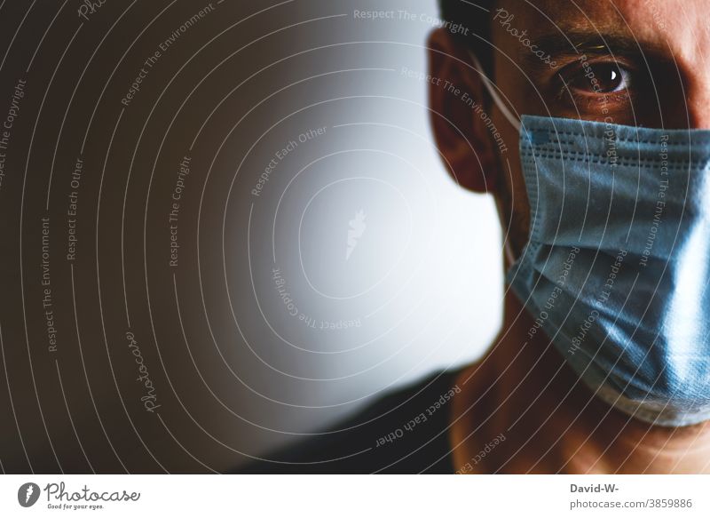 Corona - Man with breathing mask / mouth guard Mask corona Respirator mask Protection Risk of infection pandemic Quarantine Face coronavirus Humanity