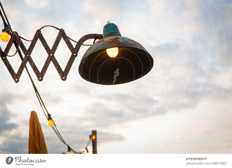 old lamp at the beach of Holland Lamp Light Things Street lighting Beach Sunshade Electric bulb Lamplight pears Artificial light Colour photo Illuminate