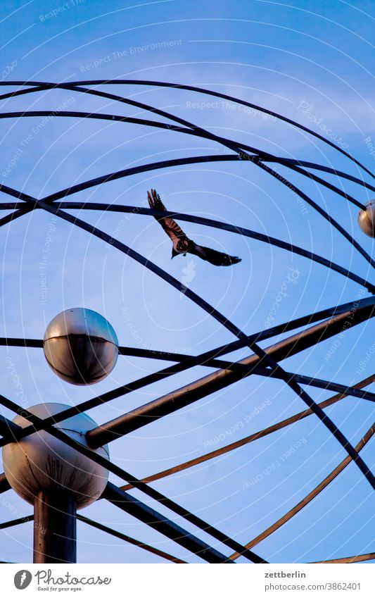 World time clock with crow alex Alexanderplatz Architecture Berlin city Germany Worm's-eye view Capital city Sky downtown Middle Modern New building Planet