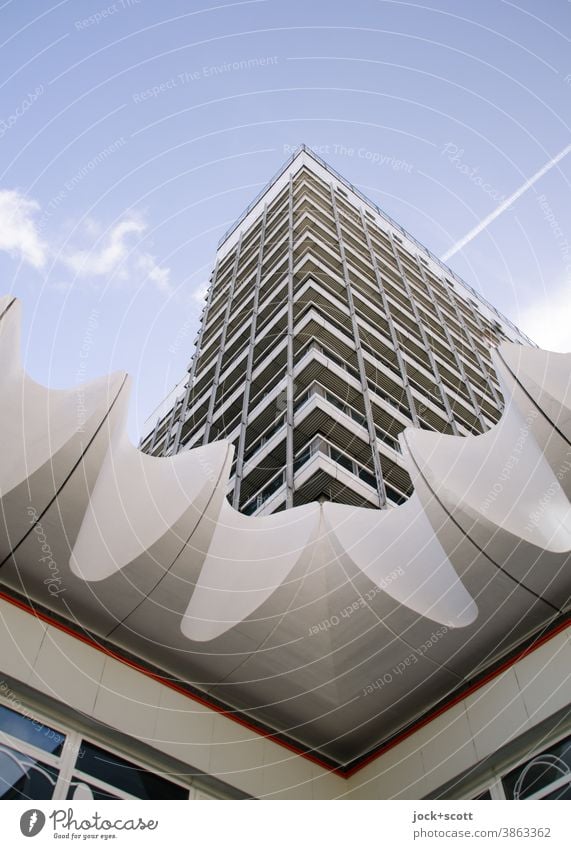 Architecture with corners and edges GDR Downtown Berlin High-rise Facade Sharp-edged Tall Retro Corner Structures and shapes Symmetry Worm's-eye view