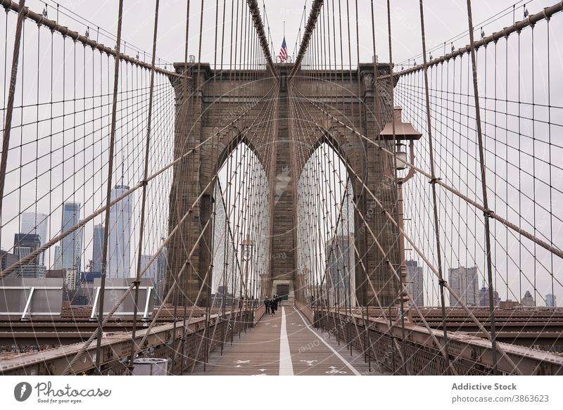 Suspension bridge over river in city brooklyn bridge suspension cable architecture construction cloudy urban structure new york usa america united states