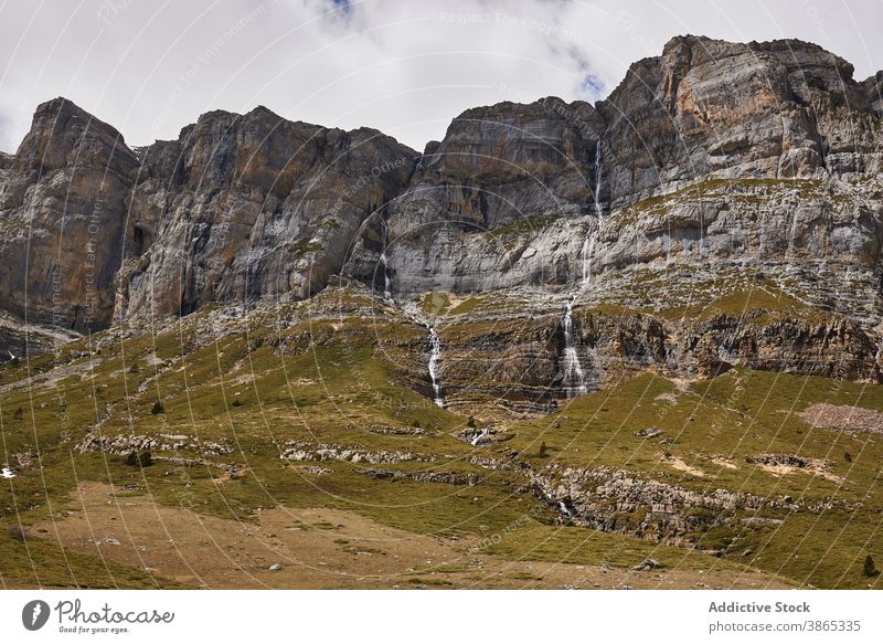 Magnificent landscape of mountains on cloudy day pyrenees range sky valley nature wonderful scenery ordesa valley spain ridge scenic highland destination