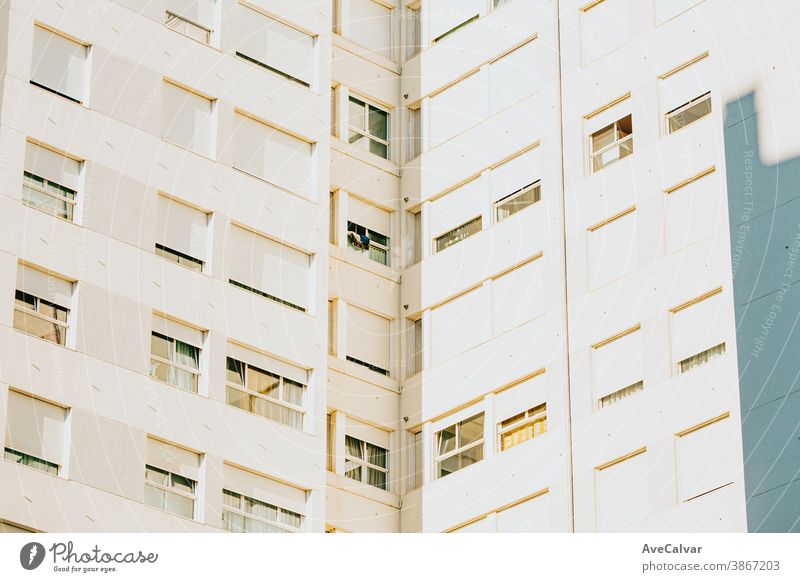 Symmetrical close up of a wall of windows on a building with copy space and design skyscraper symmetry growth futuristic horizontal business color image