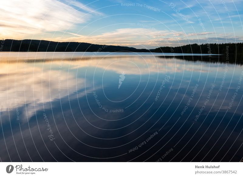 Beautiful evening view at the blue hour over the Safssjon  lake background beautiful beautiful landscape blue hour photopgraphy calm calm water clouds