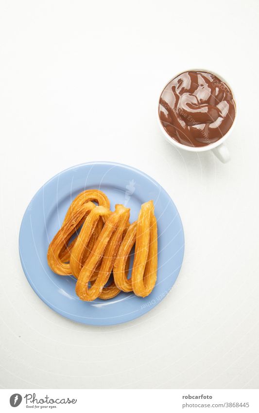 delicious churros to take with hot chocolate spanish snack breakfast background traditional fried brown bakery mexican biscuit coffee culture food calories