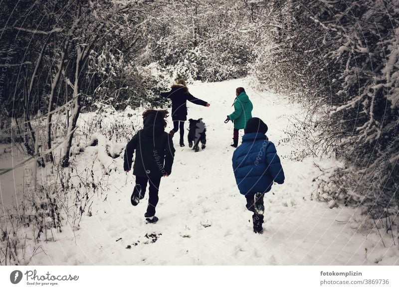 jumping children on a snowy path Winter vacation snowed over be a child Playing Infancy Snowscape preschool child childcare Winter sports Parenting