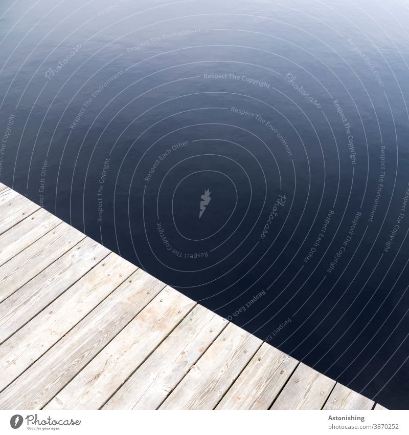 on the jetty Footbridge Wood Water Dark Screw Blue Black Pond Rubner Pond Tanner Moor boards Lake Nature Brown Exterior shot Bog Deserted Simple Simplistic