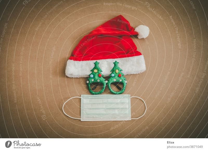 Christmas during Corona concept with Christmas cap, funny glasses and face mask. corona Mask Christmassy Christmas & Advent Christmas hat Santa Claus hat