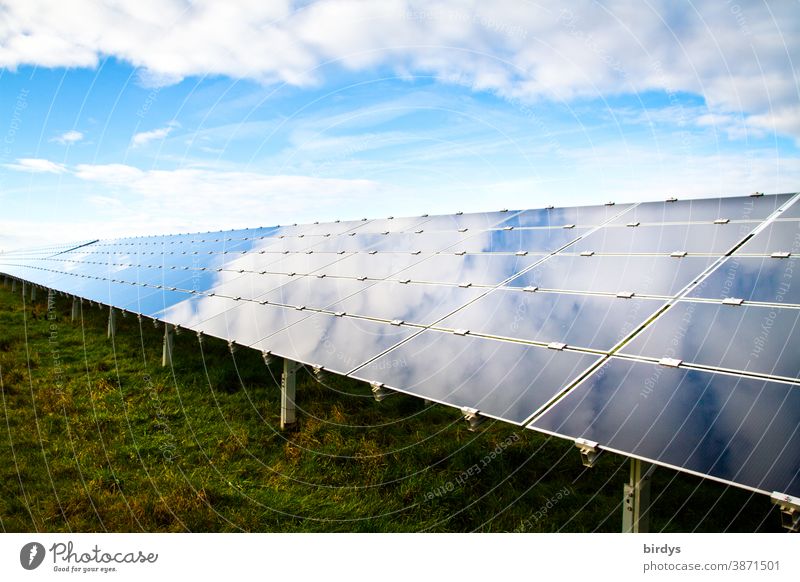 Solar park, photovoltaics, sky reflected in a field of photovoltaic modules regenerative energy solar park Photovoltaic Modules Energy industry Renewable