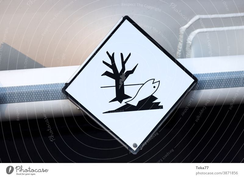 a danger toxic sign on an fuel truck caution toxic sign toxic fuel danger to life fuel truck sign gas truck oil truck cerosine truck modern fuel truck white