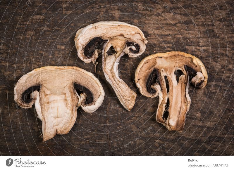 Dried mushrooms on a cutting board. Mushroom mushroom dish chanterelle food Eating food products germlings beggars Agaricomycotina Chanterelle edible mushroom