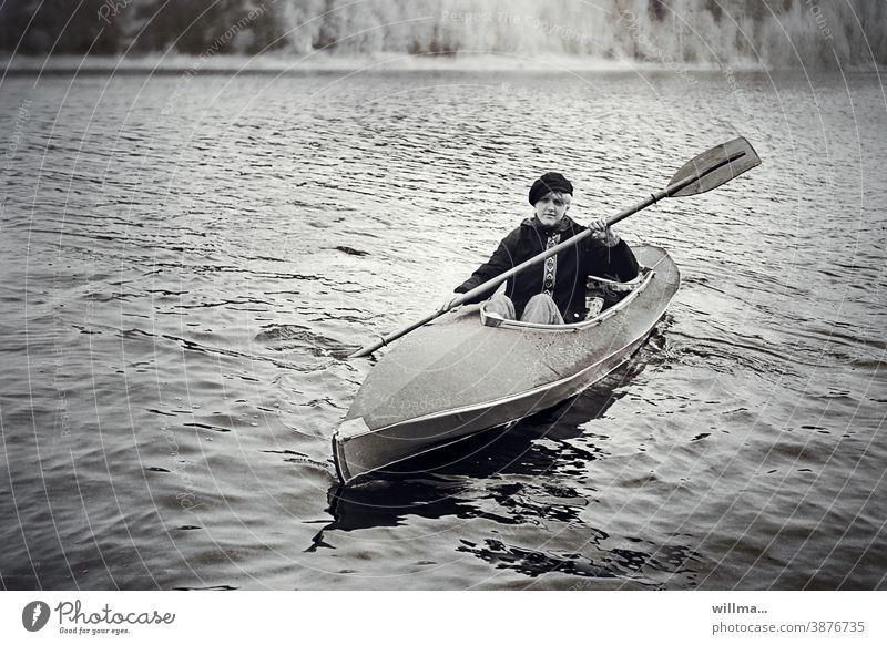 Analog paddling Paddling canoe Kayak Canoe recreational sport hobby vacation Woman young girl Fear Leisure and hobbies Aquatics Water Lake Adventure Canoe trip