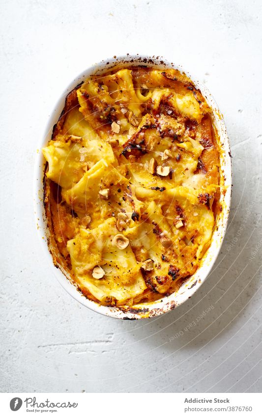 Appetizing baked squash served on table dish vegan vegetarian food vegetable garnish basil delicious green dinner tasty cook tradition ingredient recipe