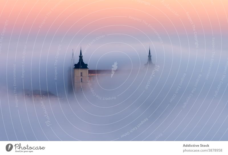 Amazing cloudy sunset sky with sharp peaks of cathedrals architecture environment medieval heritage ancient castle mystery idyllic historic toledo tranquil old