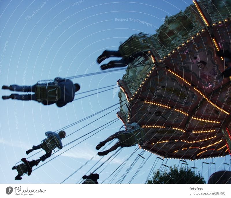 chain carousel Carousel Fairs & Carnivals Leisure and hobbies Feasts & Celebrations Human being Flying Sky Blue Joy