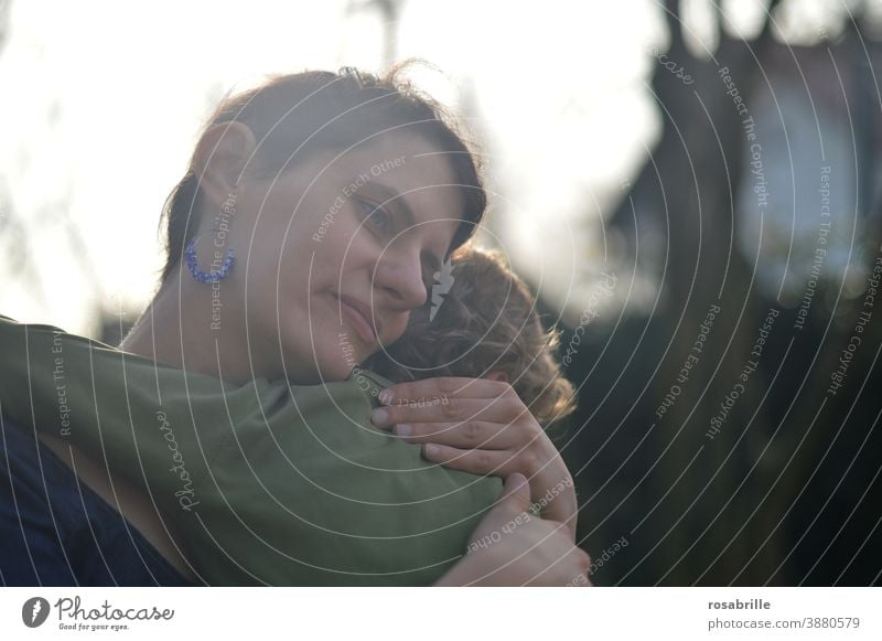 young mother holding small child Mother Child Motherly love Mother's Day Love Display of affection Son Woman Toddler Embrace arm hold on the arm stop Family