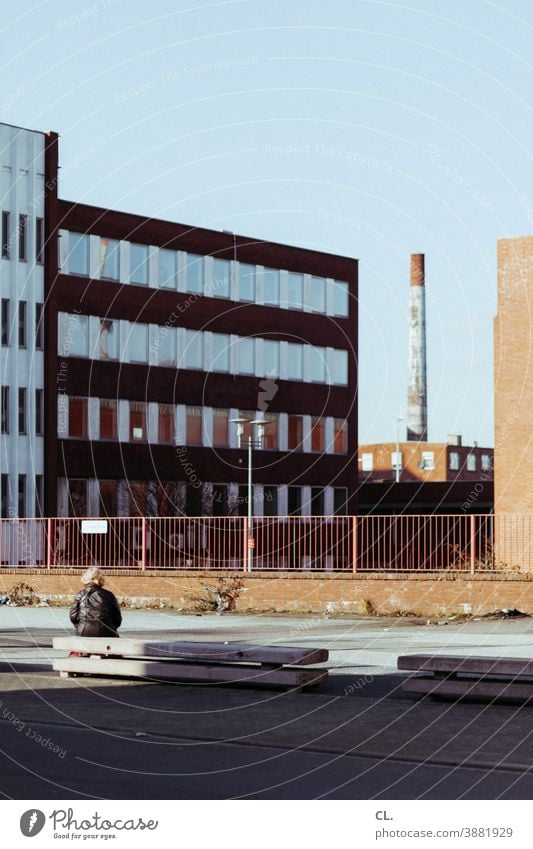 bonjour tristesse Woman Sit Industrial site Loneliness on one's own Goodbye Gloomy Wait Sadness Lonely Ruhr Valley person Fence silent tranquillity Chimney