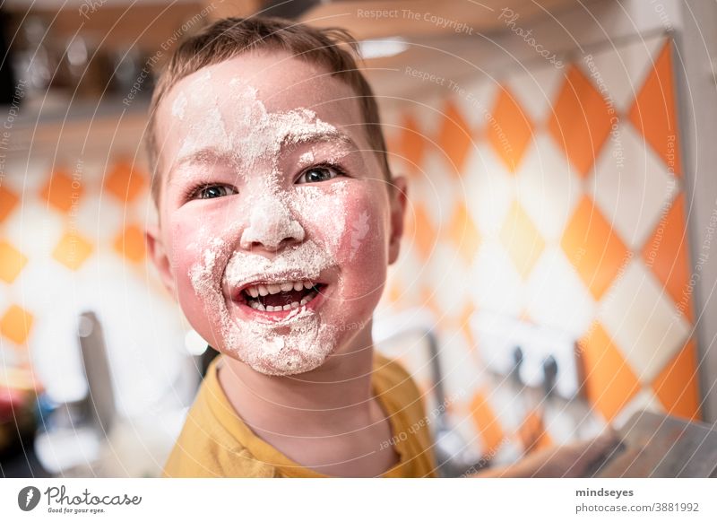 Little boy baking with flour on his face make Christmas Christmas baking Baking Flour muck about fun Playing Happy Child Infancy Joy Lifestyle Christmas biscuit