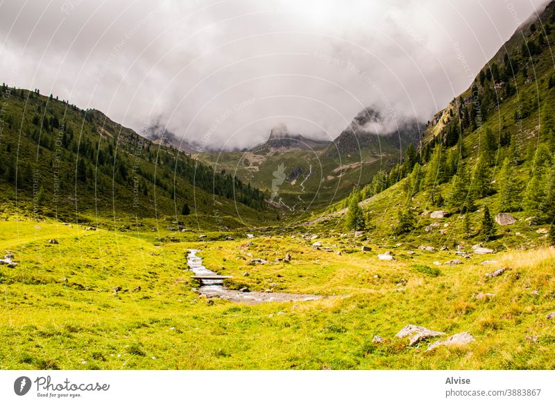 streams on the Alps of South Tyrol twelve alps austria tirol scenics scene flowing fall climb courage dangerous summit sports trekking waterfall outdoor peak