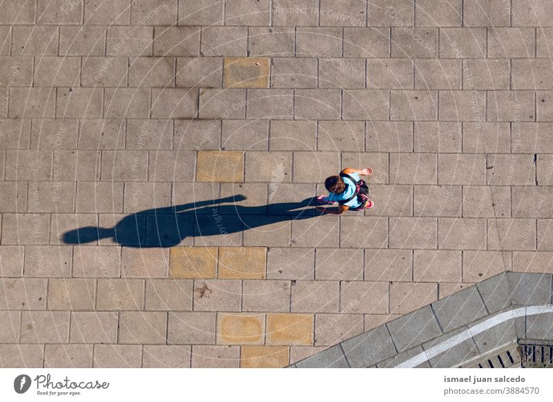 tourist walking on the street in Bilbao city, Spain tourism person people human pedestrian shadow silhouette outdoors action travel destination bilbao spain