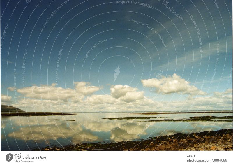 to the horizon Ocean Reflection Water Clouds coast Ireland Sky Nature Landscape Blue Lake reflection Reflection in the water as smooth as glass White