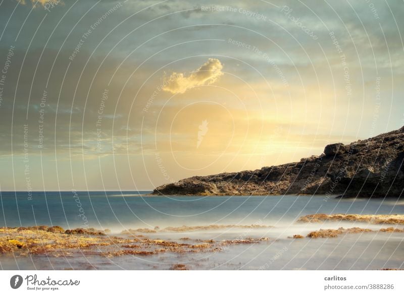 Cala Murada | The time stands Majorca Beach Bay Water Ocean Long exposure Rock coast Landscape Sky Deserted Vacation & Travel Summer Beautiful weather Island