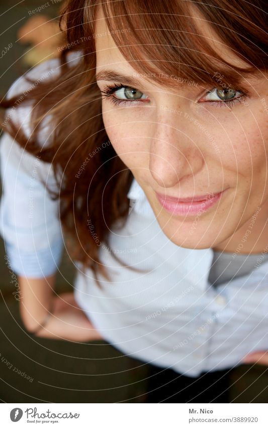 woman Looking into the camera Bird's-eye view look up Hair and hairstyles Smiling pretty Long-haired Upward Emanation Face naturally Ease Upper body portrait