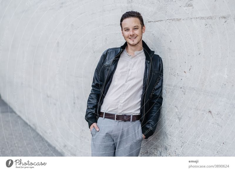 young man, business, outdoor masculine more adult Upper body arms folded Young man Man Friendliness Smiling Positive Impish Looking into the camera Business