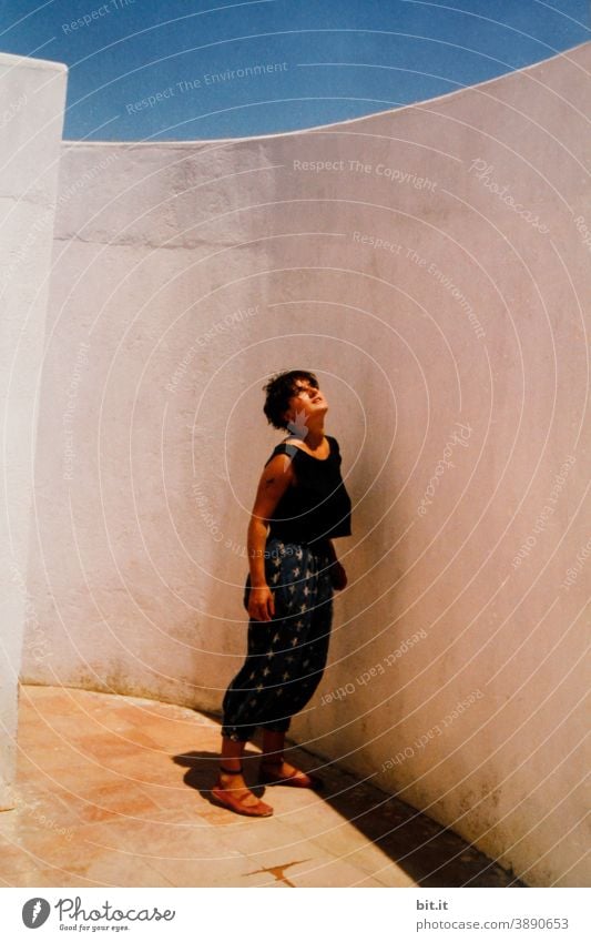 Look at the clouds... Woman Young woman Youth (Young adults) Human being Portugal Algarve Wall (barrier) Wall (building) House (Residential Structure) Sky Blue