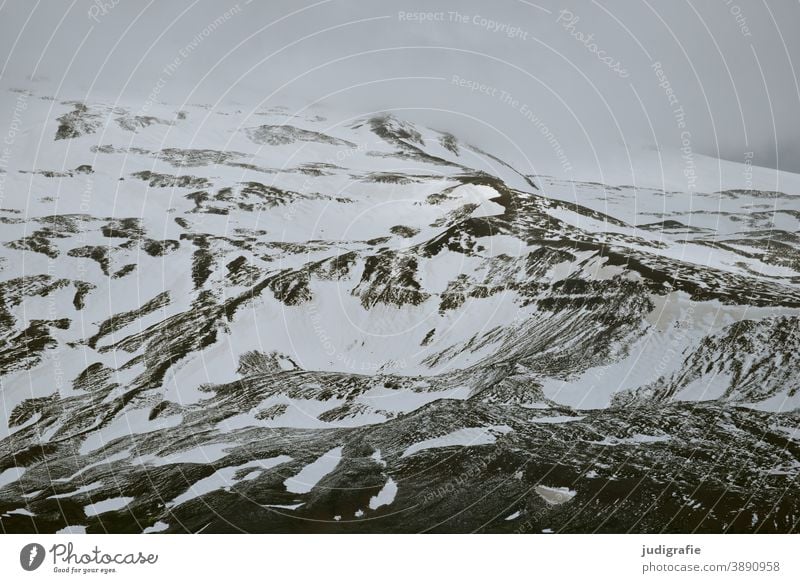 Huge icelandic mountain with snow Mountain mountain massif Snow Cold Iceland Landscape Nature Exterior shot Snowcapped peak Rock Climate Frost Wood grain