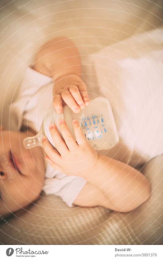 Baby with bottle Parenting Bottle Drinking Thirst youthful Infancy Child