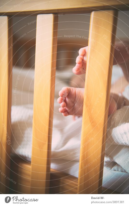 little feet of a baby at the crib Baby Toddler Cute baby feet Toes Small Sleep Infancy Delicate Bed