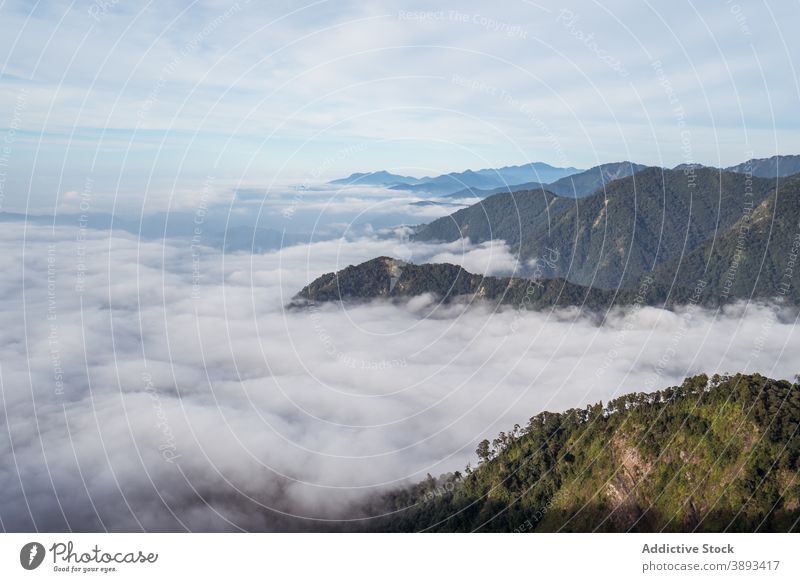 Amazing view of mountains surrounded by clouds landscape breathtaking sunny scenery amazing highland range ridge yuanzui mountain taiwan cloudy sky hill nature