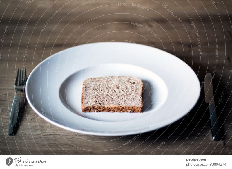 Toast on a plate toast Bread Dry Food food dry bread Nutrition Eating Baked goods Diet decrease Healthy Eating Vegetarian diet Breakfast Dinner Lunch Snack