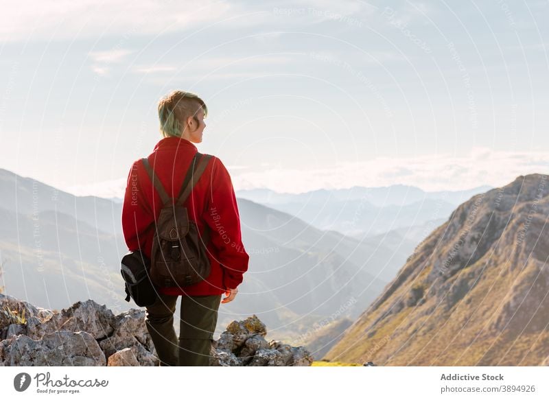 Unrecognizable traveler standing on mountain top hiker admire highland rock freedom explorer viewpoint el mazuco asturias spain picturesque nature landscape