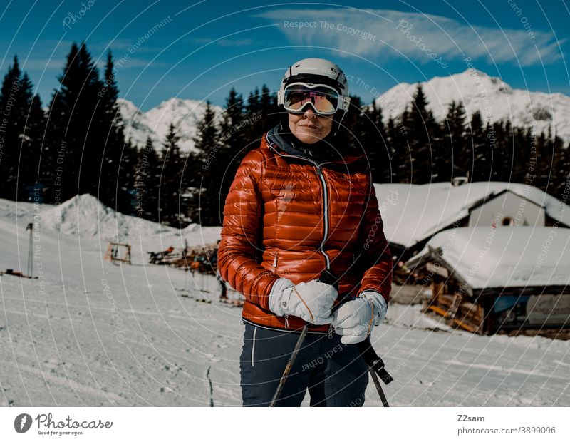 Skier in Ratschings South Tyrol Skiing Winter sports mountains sheep alpine Woman Helm Sports skis Forest Landscape Green Gray chill Italian vacation Ski piste