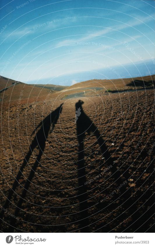 2 shadows Sunset Human being 2 Shadows in the volcano