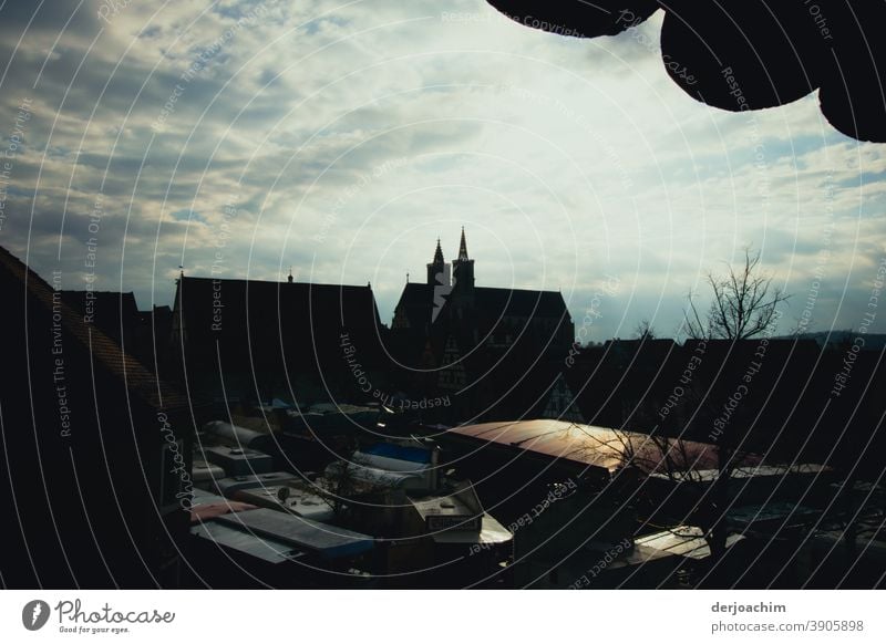 View from the city wall to Rothenburg ob der Tauber, backlit.  Architecture of the church as well as houses . Sky Town House (Residential Structure) Window