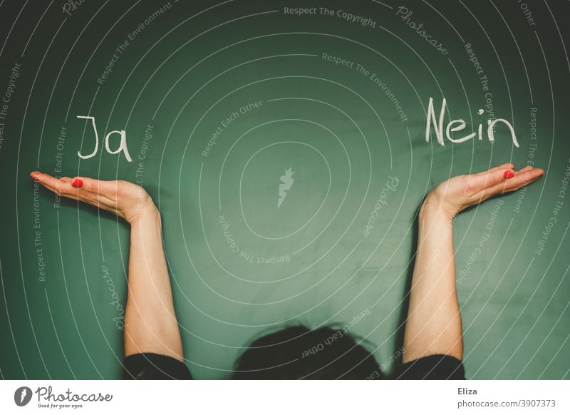 Woman weighs yes and no. Words are written on a blackboard. Yes authored Indecisive Decide make a choice Insecure Select words reconsider undecided Vaccination